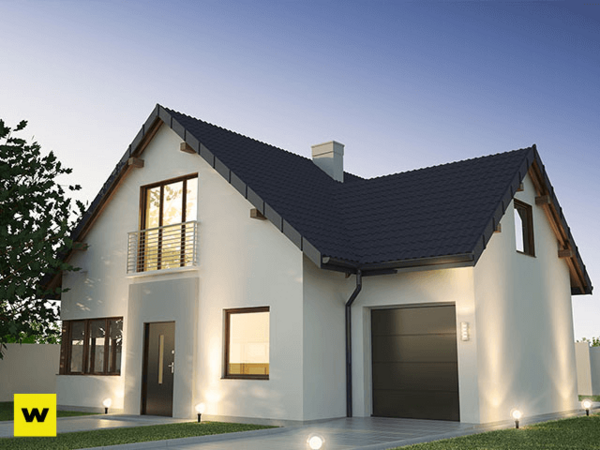 Modernes Einfamilienhaus mit Satteldach, Garage und gepflegtem Garten im Abendlicht.